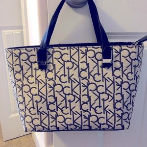 Calvin Klein small tote in black and white.
